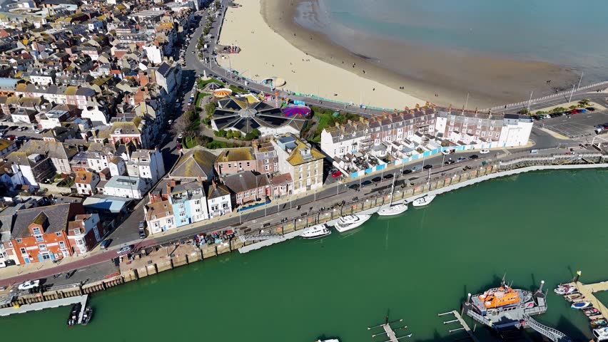 Tilt up over Weymouth Harbour in Dorset