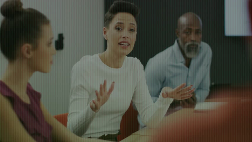 Business meeting discussion with binary code animation overlaying diverse team. technology, teamwork, collaboration, brainstorming, diversity, coding - Powered by Shutterstock - Get 15% off with code: PIKWIZARD15