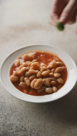 White bean tomato sauce gourmet food background on the table rustic food top view copy space keto and paleo diet vegetarian and vegan food