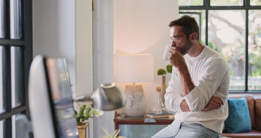 Happy, man and thinking to relax at house with coffee drink, weekend break and ideas of calm morning. Male person, thoughts and warm beverage for reflection, memory and planning of self care solution