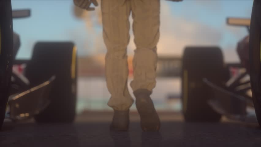 Race Day Champion: Driver Walking Between Two Racing Cars at Sunset