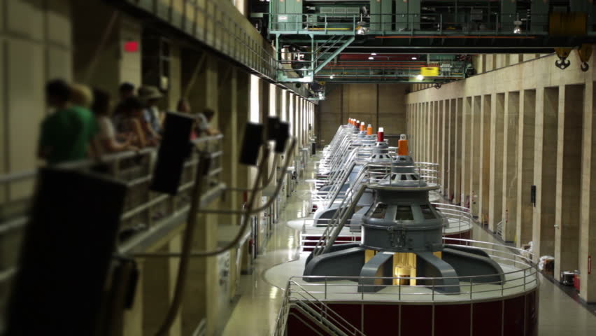 Tourists visiting the electricity generating turbines at the Hoover Dam on the