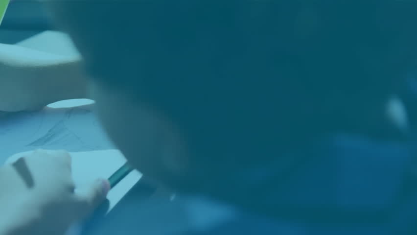 In school, child drawing with pencil, digital security animation overlaying scene. Education, cybersecurity, technology, creativity, art, learning - Powered by Shutterstock - Get 15% off with code: PIKWIZARD15