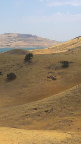 CALIFORNIA - 01.01.2021 -Time lapse of clouds moving over the land in Central California near the San Luis Reservoir.