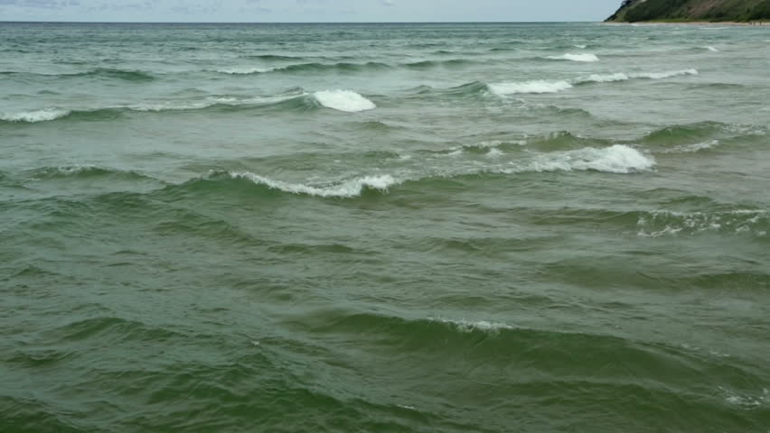 Waves coming in on Lake Michigan, USA. Looping clip.