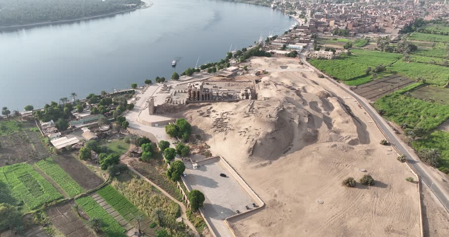 Egypt Aswan September 2023 : Daytime drone footage explores Kom Ombo Temple�s unique double design, Ptolemaic architecture, and Nile River views in Aswan, Egypt.