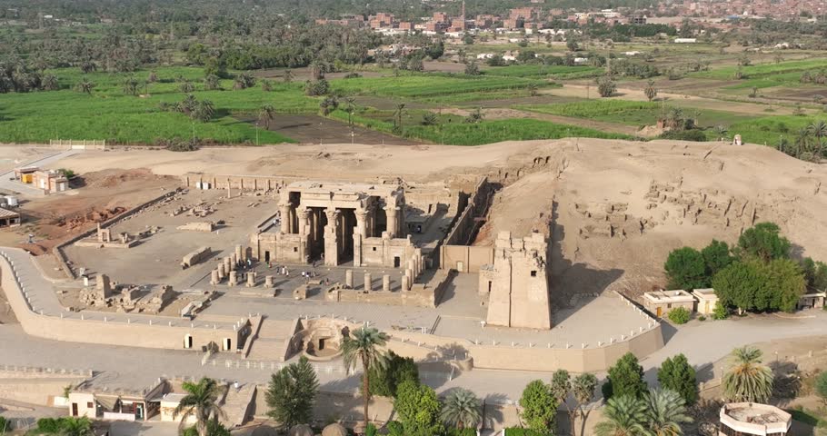 Egypt Aswan September 2023 : Drone views of Egypt�s Kom Ombo Temple�symmetrical Ptolemaic ruins, crocodile god Sobek relics, and Nile Valley desert landscapes.