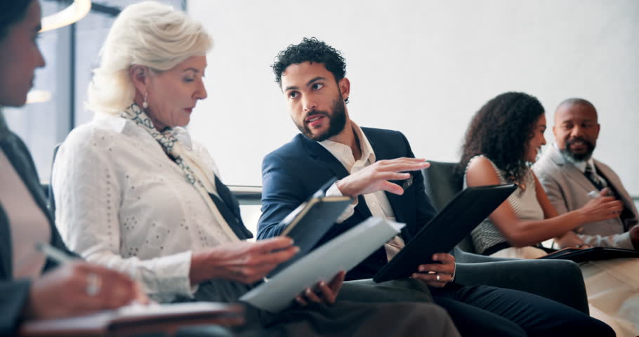 Hiring, interview and business people in discussion in waiting room for cv tips, help and job hunting. Group, recruitment and conversation in office for career search, human resources and resume