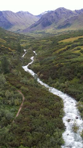 ALASKA - 2023 - Excellent aerial footage passing over a river in Alaska