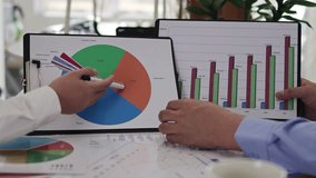 Corporate white-collar workers doing financial planning and data analysis - Powered by Shutterstock - Get 15% off with code: PIKWIZARD15