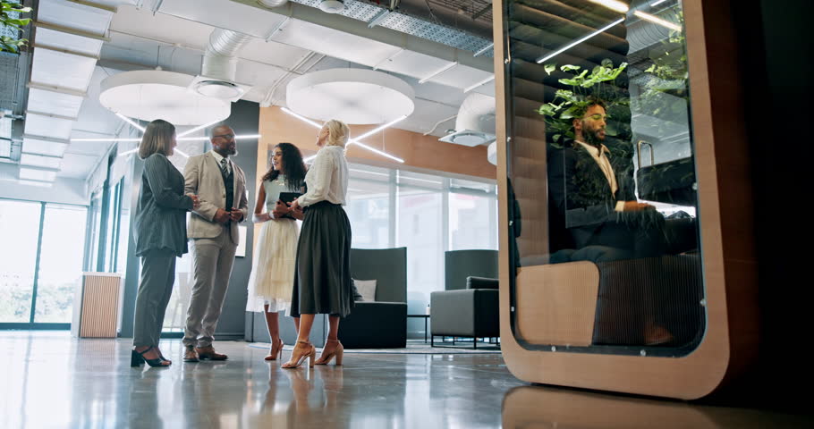Business people, lobby or team conversation, coworking or soundproof pod for private workspace. Group, meeting or discussion with sustainability manager for brainstorming eco friendly ideas in office