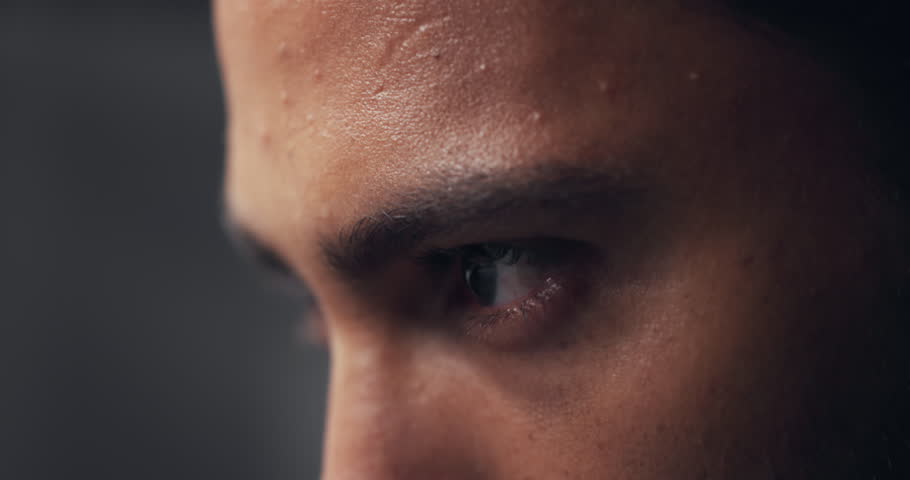 Thinking, eyes and man with vision closeup, insight or reflection on gray studio background. Idea, face and zoom with person planning decision, problem solving and inspiration with macro for mindset