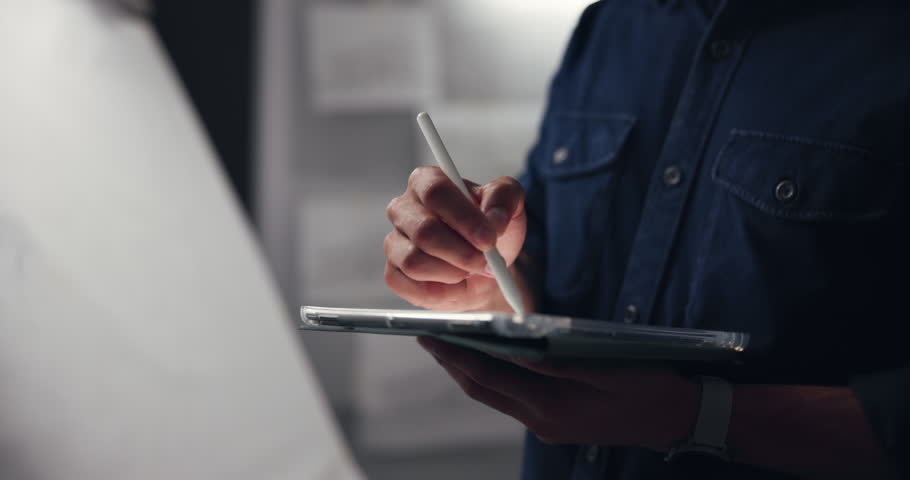 Tablet, pen and hands of man drawing in studio at night for branding prototype project. Creative, artist and male graphic designer with digital technology for animation development with sketching.