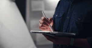 Tablet, pen and hands of man drawing in studio at night for branding prototype project. Creative, artist and male graphic designer with digital technology for animation development with sketching. - Powered by Shutterstock - Get 15% off with code: PIKWIZARD15
