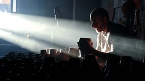 "A skilled artisan works with pottery in a workshop filled with cultural elements. The soft light illuminates the handmade pieces, showcasing the craftsmanship and artistry of traditional pottery." - Powered by Shutterstock - Get 15% off with code: PIKWIZARD15