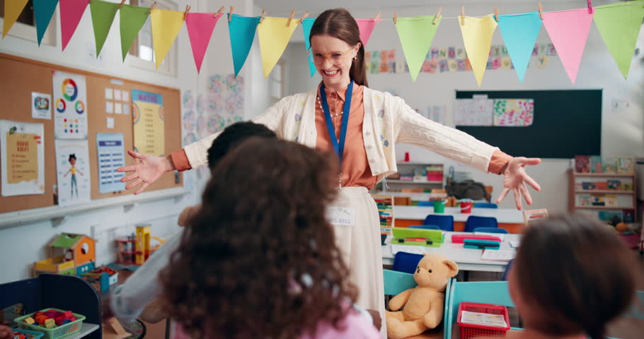 Teacher, happy and hug children in classroom, school and support with growth development at academy. Education, thank you and embrace with kids, students gratitude and love for learning knowledge