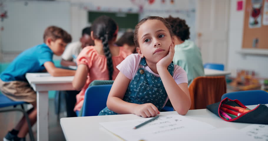 Girl, preschooler and child thinking in classroom with books, education and learning development. ADHD, kid and bored female student daydreaming for lesson, ideas and knowledge in artistic assessment