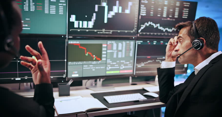 Frustrated businessmen, screen and stock market with headphones or stress for financial loss. Male people, broker or agents with display, chart or graphs for bad news, crisis or investment crash