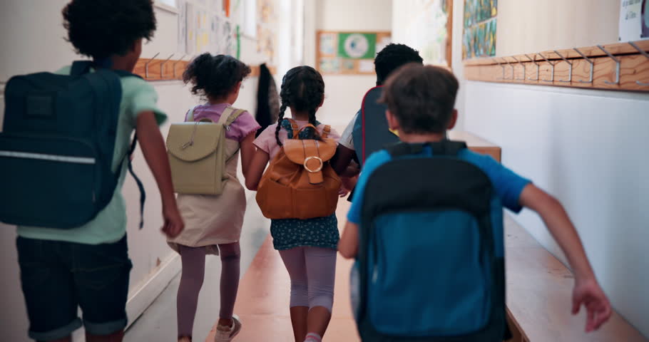 School, students and children in hallway running with backpack, excited for learning and education from back. Energy, fun and knowledge with happy, friends and together outside classroom for lesson