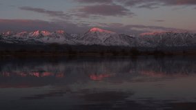 Sunrise on Mountains with Reflection Lake - Powered by Shutterstock - Get 15% off with code: PIKWIZARD15