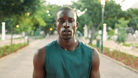 Black man, face and breathing with wind for fitness, break or endurance technique at outdoor park. Portrait, male person or African runner with rest or deep breath for physical exercise or training - Powered by Shutterstock - Get 15% off with code: PIKWIZARD15