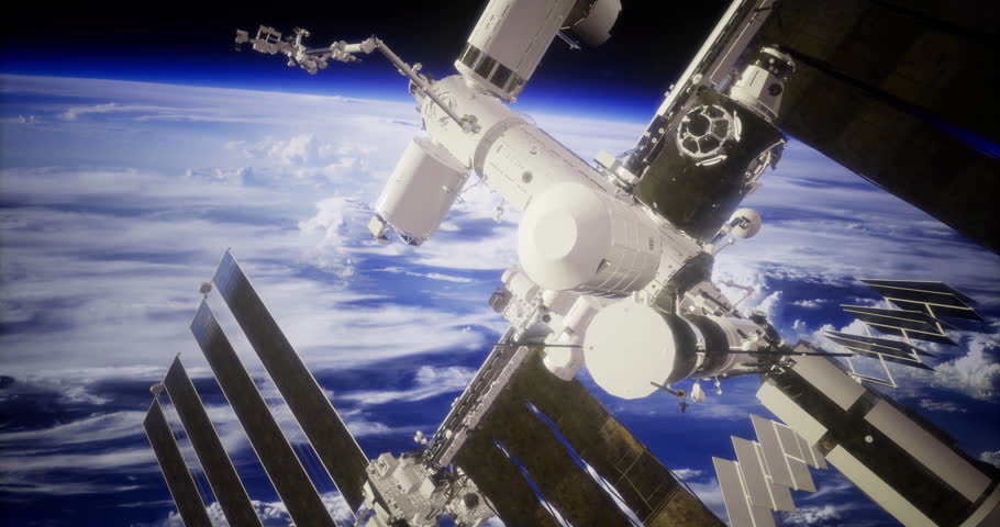 A detailed view of the international space station floating above Earth, surrounded by vibrant clouds and the deep blue of the atmosphere during daylight hours.