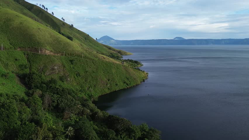 Aerial view of Lake Toba and green hills in Silalahi, Dairi, North Sumatra, Indonesia