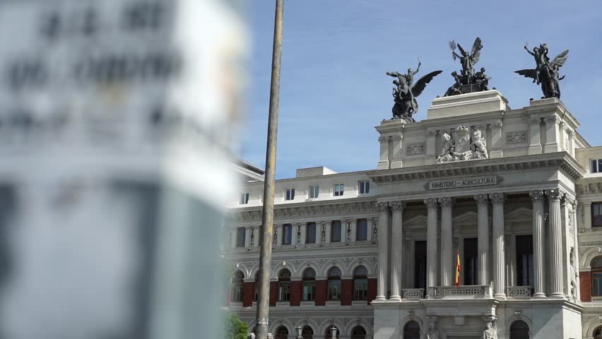 Ministry of Agriculture in Madrid and passing cars. City. Madrid Tourism.