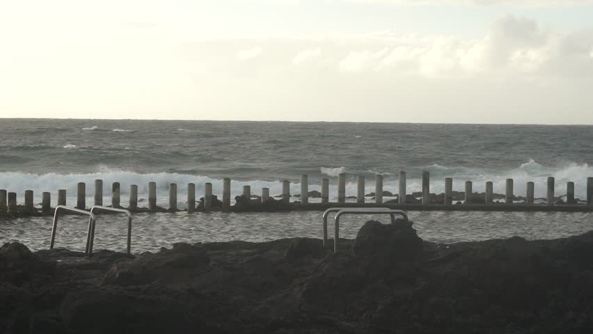 Natural beaches of Agaete with the sea in slow motion in Las Palmas de Gran Canaria