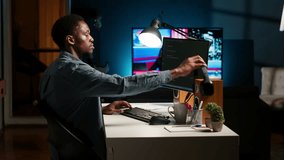 Young programmer engineer writing binary code data on terminal window, doing freelance work at home setup. Software developer working on troubleshooting with programming language. Camera B. - Powered by Shutterstock - Get 15% off with code: PIKWIZARD15