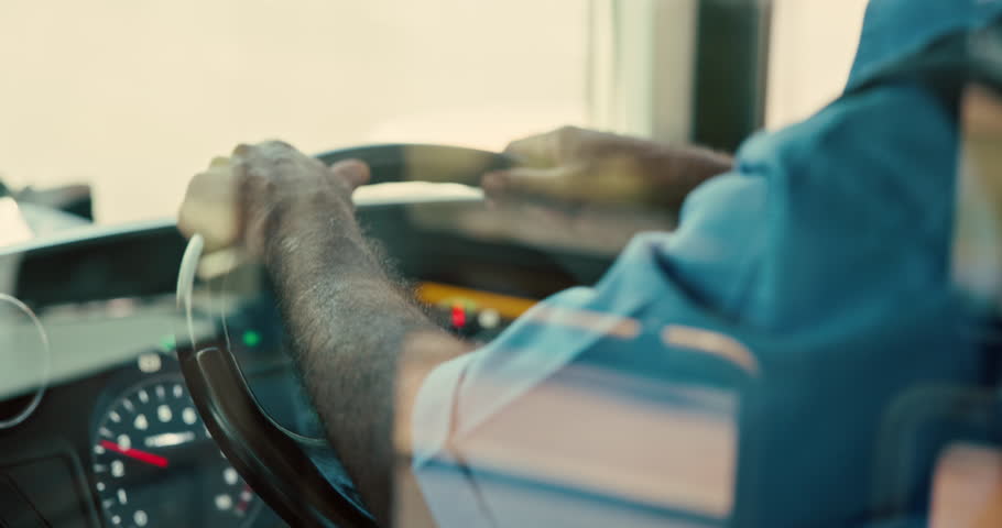 Bus, travel and driver with hands, man or public transportation with city service. Person, employee or closeup with steering wheel, route or schedule with traffic, safety or urban journey in New York