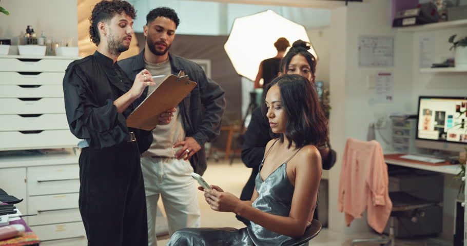 Phone, hair stylist or woman in studio backstage for production, photoshoot preparation or talk. Beauty, cosmetics or model on set with artist for haircare, creative or crew planning with hairdresser