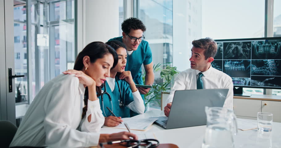 Laptop, laughing and people planning for healthcare treatment, mentor and surgery internship. Clinic interns, discussion and online for digital medical records, x ray and website for orthopedics