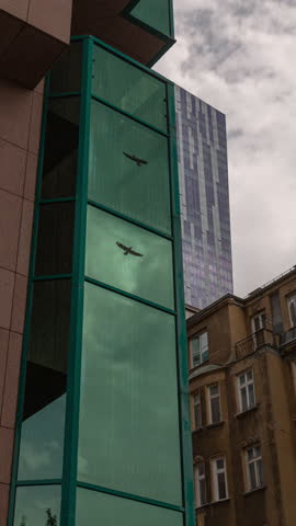 day time warsaw city center famous old residential buildings and new modern office tower exterior vertical panorama timelapse 4k poland