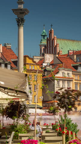sunny day warsaw city center famous old town cafe terrace square panorama vertical timelapse 4k poland