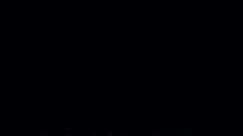 Super Slow Motion Shot of Flying Water Splash Isolated on Black Background, 1000fps.