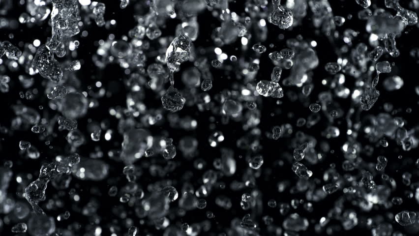 Super Slow Motion Shot of Flying Water Splash Isolated on Black Background, 1000fps.