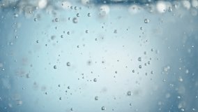 Super Slow Motion Shot of Air Bubbles Flowing in Water on Light Blue Background at 1000fps. - Powered by Shutterstock - Get 15% off with code: PIKWIZARD15