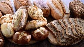 Assorted bakery products including loaves of bread and rolls - Powered by Shutterstock - Get 15% off with code: PIKWIZARD15