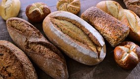 Assorted bakery products including loaves of bread and rolls - Powered by Shutterstock - Get 15% off with code: PIKWIZARD15