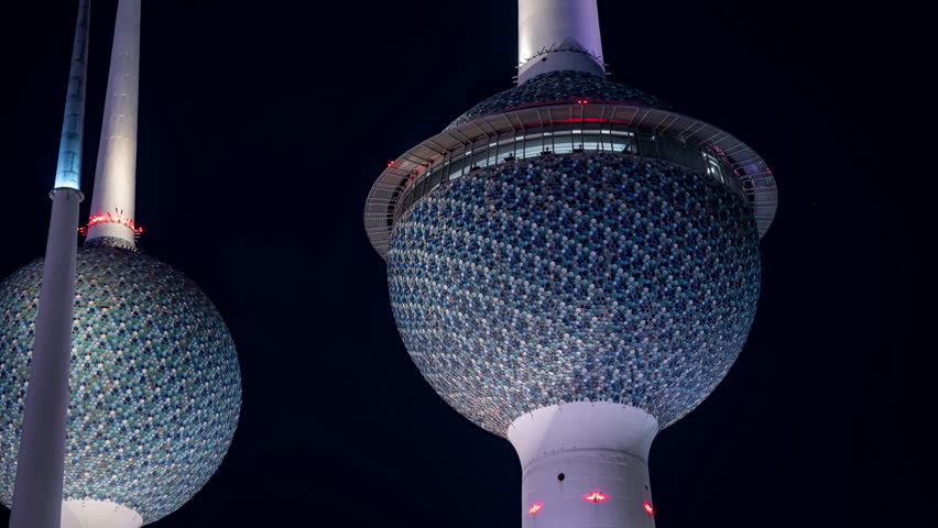 Close up view of 1 of the 3 towers of the famous Kuwait Towers in Kuwait City. Seen at night