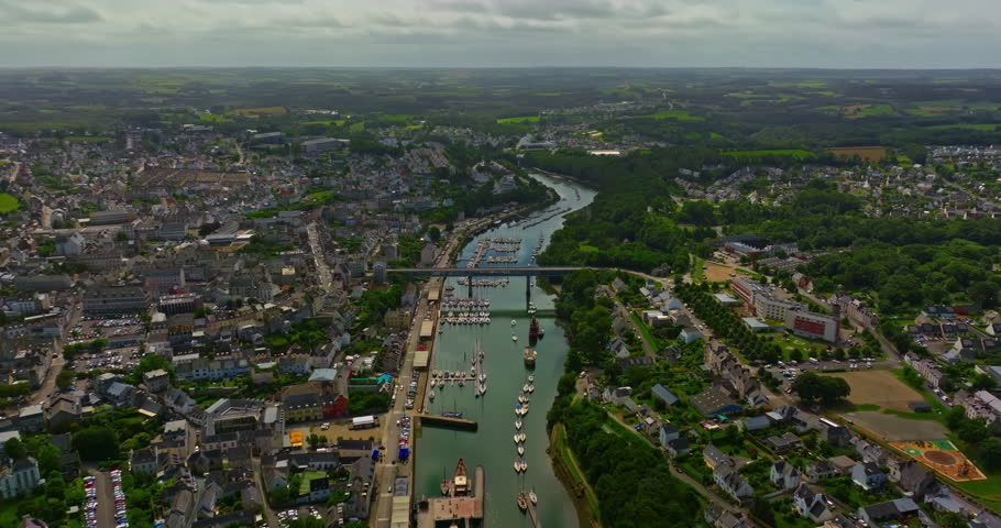 A beautiful city on the Atlantic Ocean on the west coast of France. Aerial view on the harbor of Douarnenez in Brittany. A quiet fishing bay with yachts and boats
