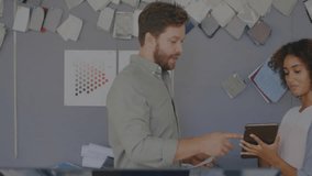 Two people discussing data processing animation over office board with notes. Business, collaboration, brainstorming, teamwork, technology, analytics - Powered by Shutterstock - Get 15% off with code: PIKWIZARD15