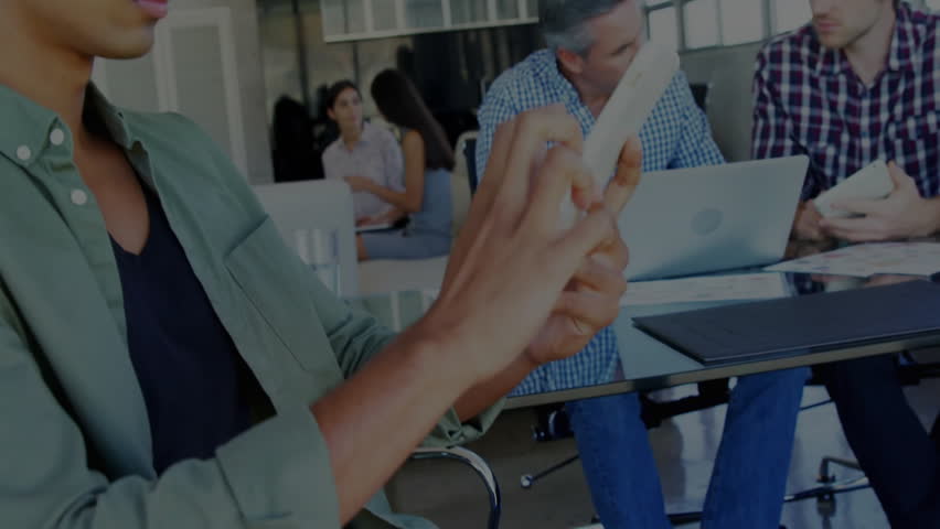 Working with futuristic data processing animation, business people in office setting. technology, teamwork, innovation, digital, collaboration, corporate - Powered by Shutterstock - Get 15% off with code: PIKWIZARD15