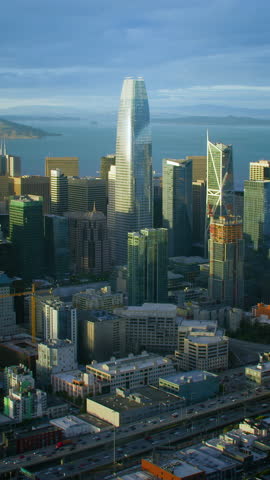  Aerial view of San Francisco financial district. Famous skyscrapers and buildings. Golden Gate Bridge in the background.
California, United States. 