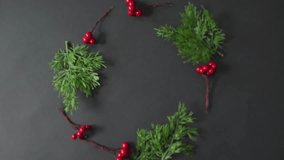 Glowing Season's Greetings text on festive wreath with dark background animation. holiday, Christmas, celebration, bright, decoration, winter - Powered by Shutterstock - Get 15% off with code: PIKWIZARD15