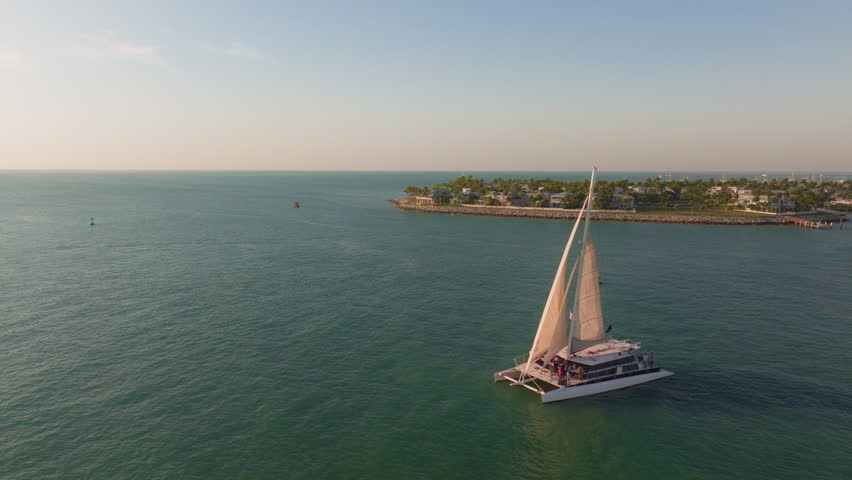 Explore the stunning aerial view of Sunset Key island in Key West, Florida, a tropical paradise with serene waters and vibrant scenery, perfect for adventurous travelers