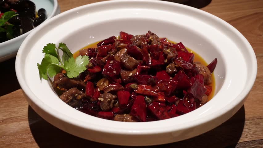 Cold rabbit is a famous cold dish in Sichuan cuisine. It is made from rabbit meat, which is marinated in a mixture of spices and sauces and then boiled.