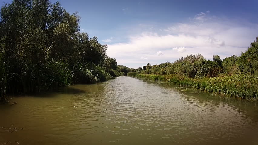 The motion of a boat on the river in the forest