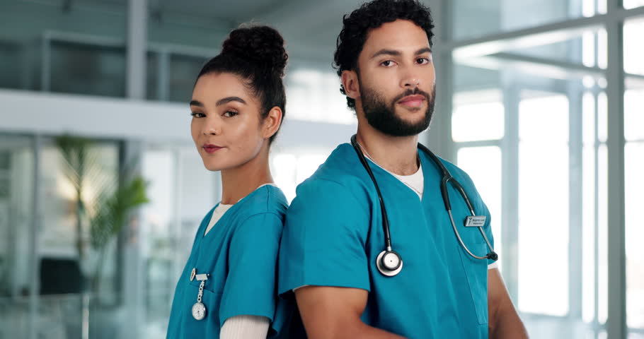 Doctors, man and woman at hospital with arms crossed, healthcare and face with services for wellness. People, surgeon and happy in portrait, career and support for cardiology at clinic in Costa Rica